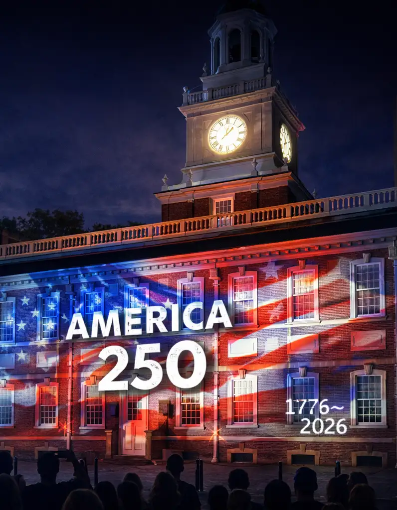 Custom gobo projection on a building exterior for decorative and branded event visuals
