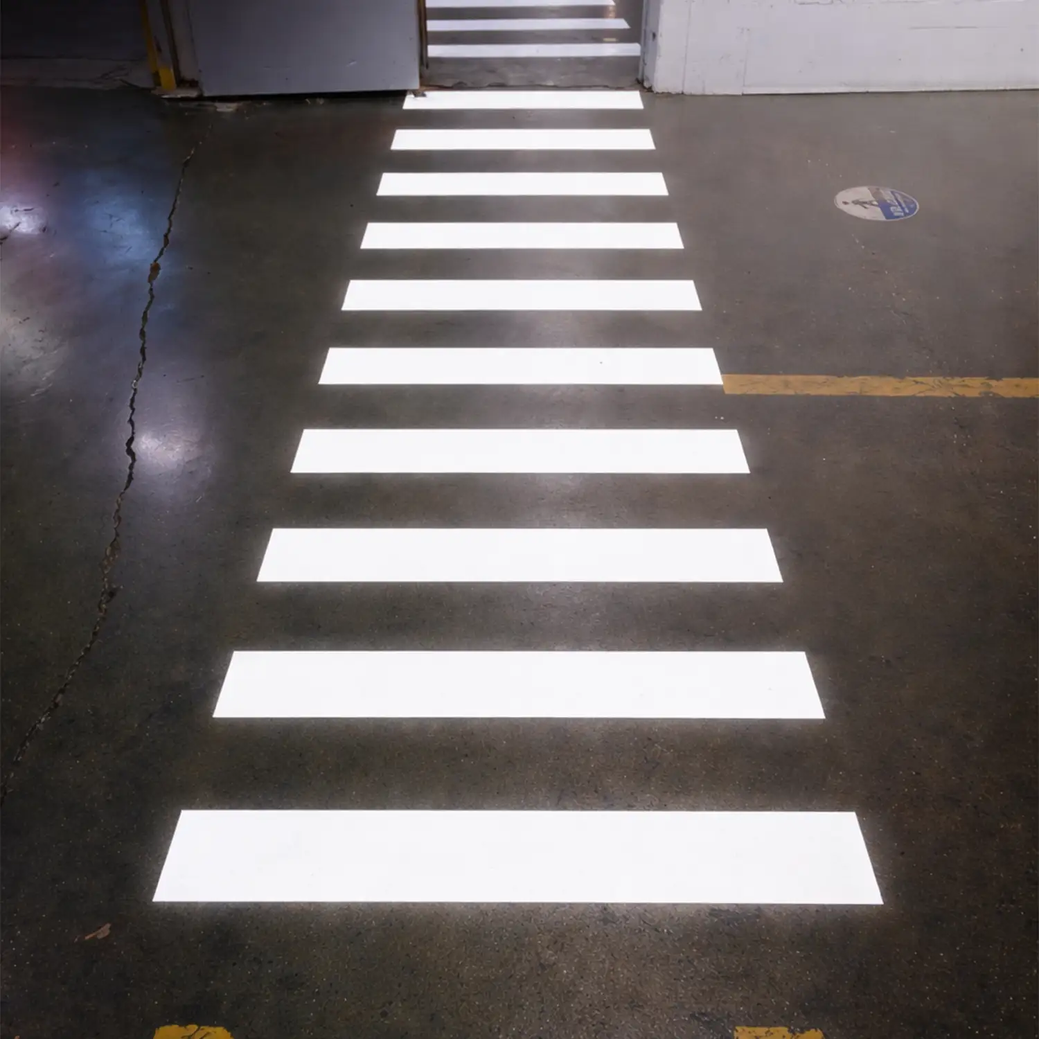 Projected pedestrian crosswalk for industrial facility